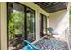 Relaxing balcony featuring outdoor seating and an outdoor rug, with lush greenery at 240 Patterson Se Ave, Atlanta, GA 30316