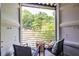 View from the balcony with chairs and a colorful ottoman at 240 Patterson Se Ave, Atlanta, GA 30316