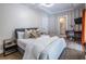 Charming bedroom with a view of the en-suite bathroom, complete with modern decor and natural light at 240 Patterson Se Ave, Atlanta, GA 30316