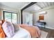 Bright bedroom featuring hardwood floors, ensuite bathroom, and desk at 240 Patterson Se Ave, Atlanta, GA 30316