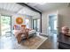 Bedroom features ensuite bathroom, natural lighting, and hardwood floors at 240 Patterson Se Ave, Atlanta, GA 30316