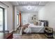 Bedroom with a view, featuring modern decor, natural light, and comfortable furnishings at 240 Patterson Se Ave, Atlanta, GA 30316