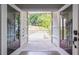 View through the modern doors to the outdoor yard space at 240 Patterson Se Ave, Atlanta, GA 30316