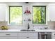 Clean kitchen featuring stainless steel appliances, double sink, and ample natural light at 240 Patterson Se Ave, Atlanta, GA 30316
