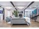 Cozy living room featuring hardwood floors and a stylish staircase at 240 Patterson Se Ave, Atlanta, GA 30316