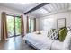 Comfortable main bedroom with balcony, modern ceiling, and spacious ensuite bathroom at 240 Patterson Se Ave, Atlanta, GA 30316