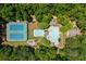 Overhead shot of tennis courts, playground, and neighborhood pool at 2735 Princeton Trce, Cumming, GA 30041