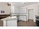 Bright kitchen with white cabinets, granite countertops, stainless steel appliances, and hardwood floors at 2735 Princeton Trce, Cumming, GA 30041