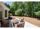 Relaxing patio area with comfortable seating and lush greenery at 2735 Princeton Trce, Cumming, GA 30041
