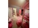 Pink bedroom featuring a bunk bed, play area, and closet at 4316 Kershaw Dr, Snellville, GA 30039