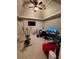 Spacious bedroom showcasing a ceiling fan and ample space for home office and exercise equipment at 4316 Kershaw Dr, Snellville, GA 30039
