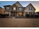 Inviting two-story home with stone accents, a covered porch, and a well-maintained front yard at 4316 Kershaw Dr, Snellville, GA 30039