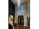 Grand foyer featuring soaring ceilings, hardwood floors, and a stunning chandelier at 4316 Kershaw Dr, Snellville, GA 30039