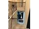 Carpeted staircase with railing leading to a landing with a black and white artistic mural at 4316 Kershaw Dr, Snellville, GA 30039
