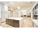 Modern kitchen with a marble island, custom cabinetry, and high-end appliances at 4550 Jolyn Pl, Sandy Springs, GA 30342