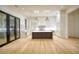 Spacious kitchen with an island, stainless steel appliances, and hardwood floors at 4550 Jolyn Pl, Sandy Springs, GA 30342