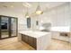 Bright kitchen with marble island, stainless appliances, and hardwood floors at 4550 Jolyn Pl, Sandy Springs, GA 30342