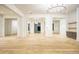 Open living area with herringbone floors, custom trim and modern lighting at 4550 Jolyn Pl, Sandy Springs, GA 30342