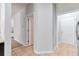 Hallway with tile flooring leading to doorways, offering a glimpse into other rooms at 137 Staley Dr, Tucker, GA 30084