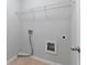 Laundry room with tile floors and hookups for a washer and dryer at 137 Staley Dr, Tucker, GA 30084