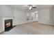 Spacious living room with neutral walls and a cozy fireplace at 137 Staley Dr, Tucker, GA 30084