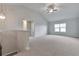 Loft featuring vaulted ceilings, a ceiling fan, and lots of natural light from a window at 137 Staley Dr, Tucker, GA 30084