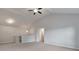 Loft featuring vaulted ceilings, modern lighting and stair access at 137 Staley Dr, Tucker, GA 30084