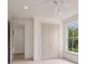 Carpeted bedroom featuring an ensuite bathroom and walk-in closet at 210 Marjean Way, Alpharetta, GA 30009