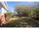 Large backyard with lush greenery and mature trees at 2785 Toney Dr, Decatur, GA 30032