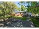Inviting backyard featuring a patio and lush greenery, perfect for outdoor relaxation and entertaining at 2785 Toney Dr, Decatur, GA 30032