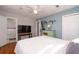 Bedroom featuring a TV, closet, and attached bathroom access at 2785 Toney Dr, Decatur, GA 30032