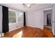 Bright bedroom featuring wood floors, natural light and modern ceiling fan at 2785 Toney Dr, Decatur, GA 30032