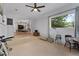 Bonus room with large window, tile flooring, and a peek into the stylish living room at 2785 Toney Dr, Decatur, GA 30032