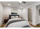 Inviting bedroom with a queen-size bed, ensuite bathroom, and ample natural light at 435 Mcwilliams Se Ave, Atlanta, GA 30316