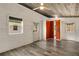 Bonus room with wood ceiling, exterior access, orange cabinet, and wood-look floors at 435 Mcwilliams Se Ave, Atlanta, GA 30316