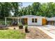 Charming single-story home with a covered porch, manicured lawn, and walkway at 435 Mcwilliams Se Ave, Atlanta, GA 30316