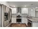 Contemporary kitchen boasts stainless steel appliances, modern cabinetry, and sleek countertops at 435 Mcwilliams Se Ave, Atlanta, GA 30316