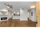 Open-concept living area with hardwood floors, modern fireplace, and seamless flow to the kitchen at 435 Mcwilliams Se Ave, Atlanta, GA 30316