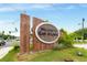 Welcome to East Atlanta sign with wood panels surrounded by lush green landscaping under a clear, sunny sky at 435 Mcwilliams Se Ave, Atlanta, GA 30316