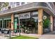 Vin ATL Wine Shop featuring expansive windows, brick accents, and a welcoming outdoor seating area at 435 Mcwilliams Se Ave, Atlanta, GA 30316