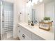 Stylish bathroom with white cabinets, modern fixtures, and coordinated decor at 503 Hearthstone Rdg, Woodstock, GA 30189