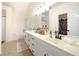 Bathroom with a double vanity and separate tub and shower at 503 Hearthstone Rdg, Woodstock, GA 30189