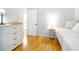 Bedroom with hardwood floors and soft, neutral decor at 503 Hearthstone Rdg, Woodstock, GA 30189