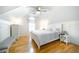 Well lit bedroom features hardwood floors and large window at 503 Hearthstone Rdg, Woodstock, GA 30189