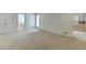 Bedroom with neutral carpet, ensuite bathroom and walk in closet at 7660 Dunvegan Close, Sandy Springs, GA 30350