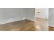 Bright living room with hardwood floors and decorative wall trim at 7660 Dunvegan Close, Sandy Springs, GA 30350