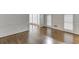 Bright living room with hardwood floors and plantation shutters at 7660 Dunvegan Close, Sandy Springs, GA 30350