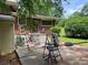 Backyard patio with stairs to back door and yard at 2433 Tilson Rd, Decatur, GA 30032