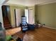 Entry way to living room with hardwood floors and open staircase at 2433 Tilson Rd, Decatur, GA 30032