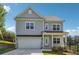 Charming two-story home with attached garage and well-manicured lawn in a desirable neighborhood at 2646 Neighborhood S Walk, Villa Rica, GA 30180